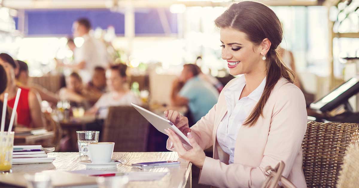 Businesswoman using an iPad.
