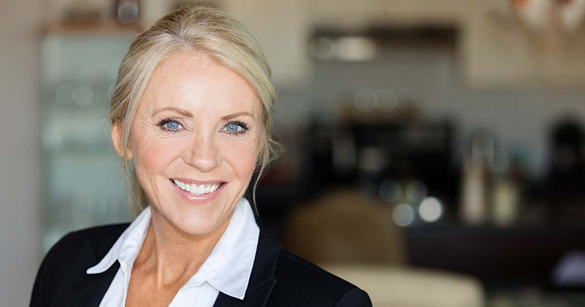 Businesswoman in a black suit.